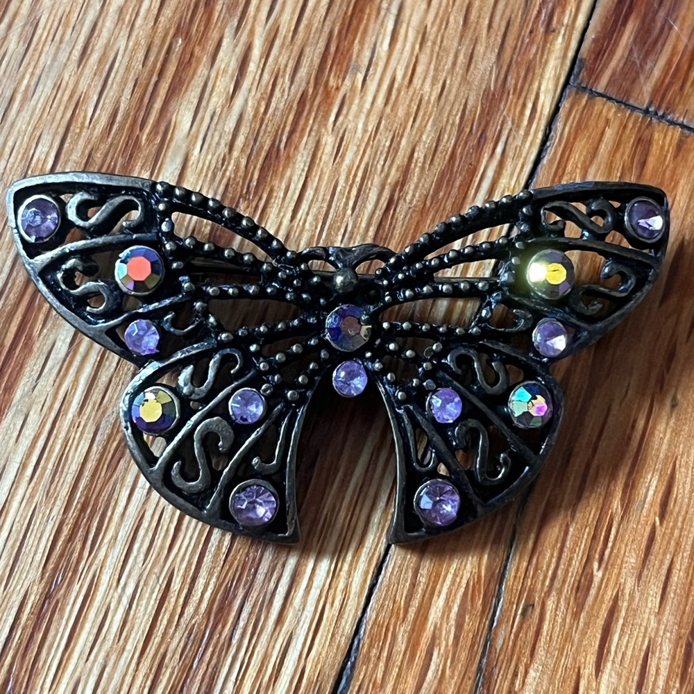 Elegant Butterfly Brooch with Purple Gemstone Accents